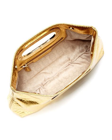 michael kors gold python clutch|Michael Kors python clutch.